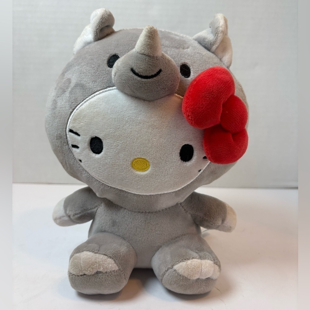 Sanrio Hello Kitty 9” plush in gray rhinoceros rhino costume signature red bow